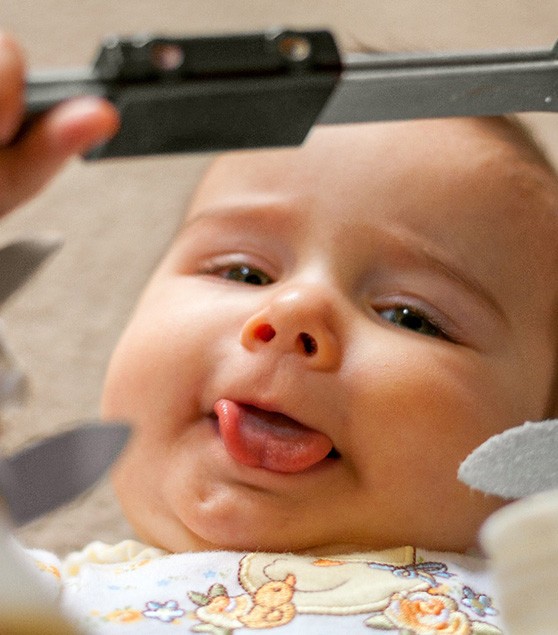 Baby licking lips after frenectomy in Corpus Christi