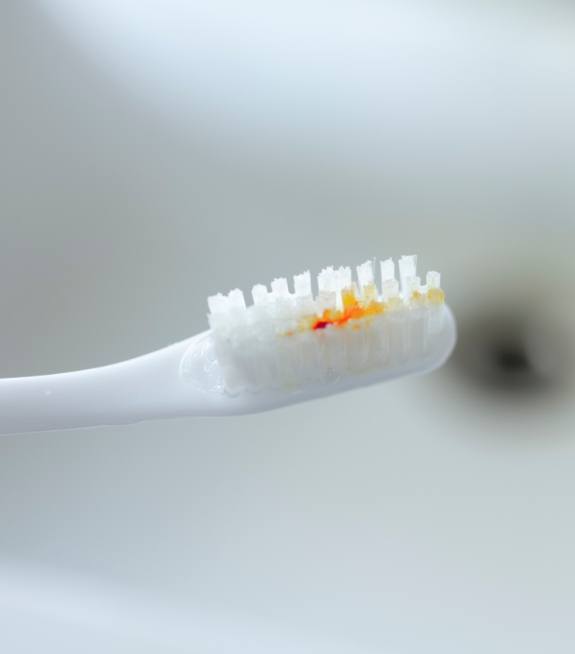 Blood spot on toothbrush