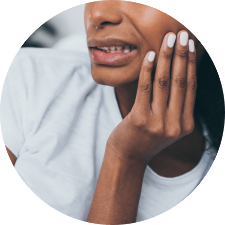 Closeup of dental patient with tooth pain before periodontal treatment