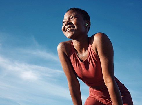 Lady smiles outdoors