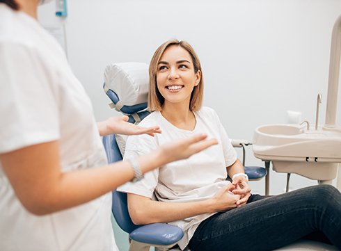 dentist talking to patient