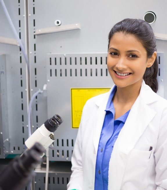 Dental technician smiling