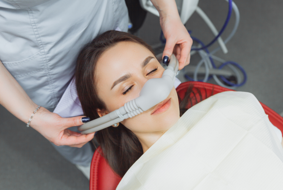 Woman receiving dental sedation